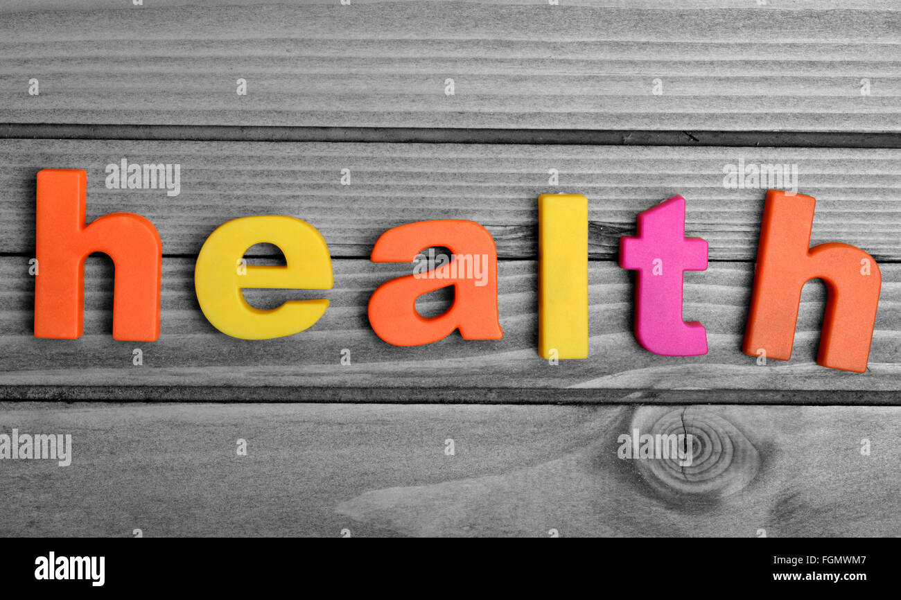 Gesundheit-Wort auf Holztisch Stockfoto