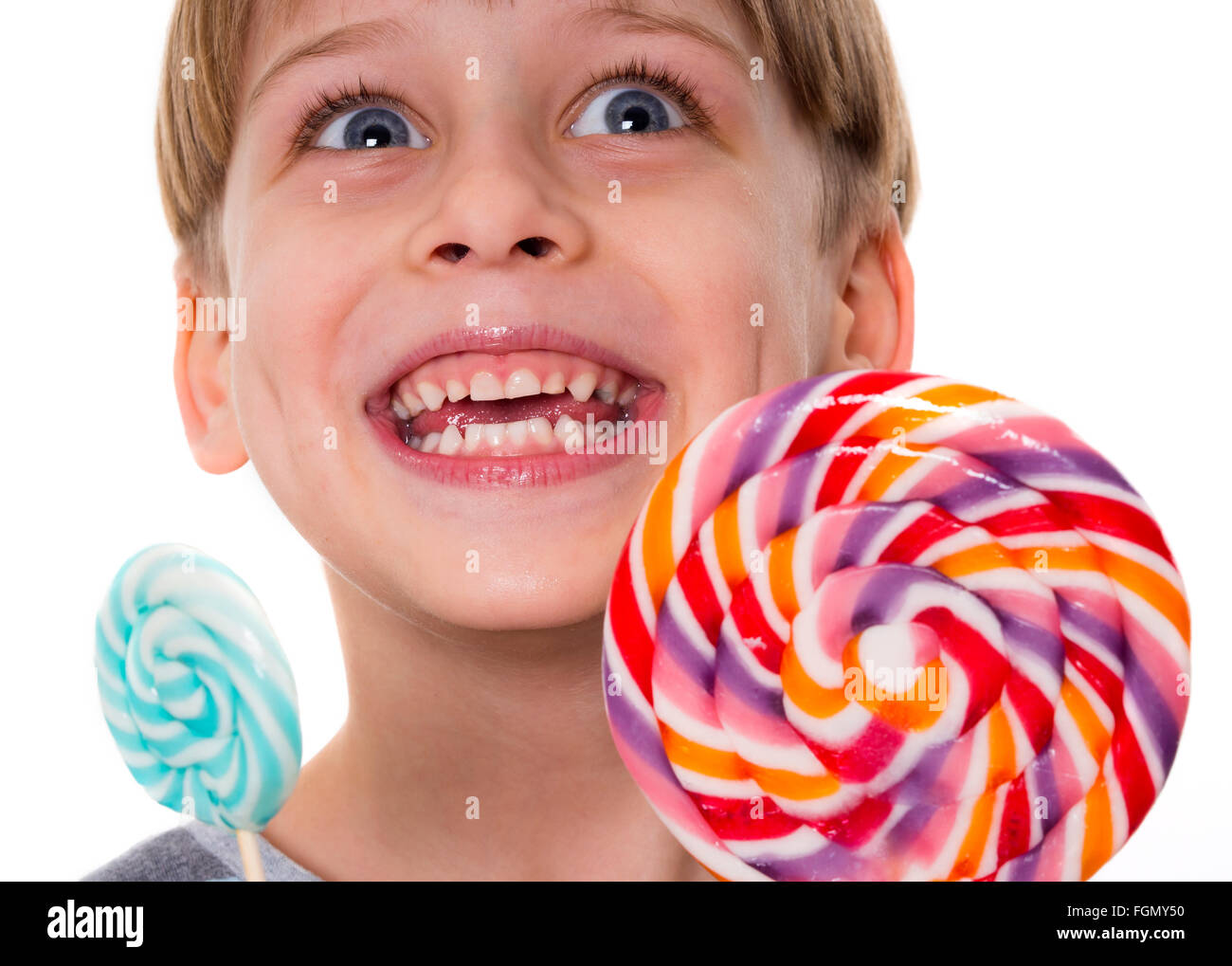 fröhlicher Junge mit lollipop Stockfoto