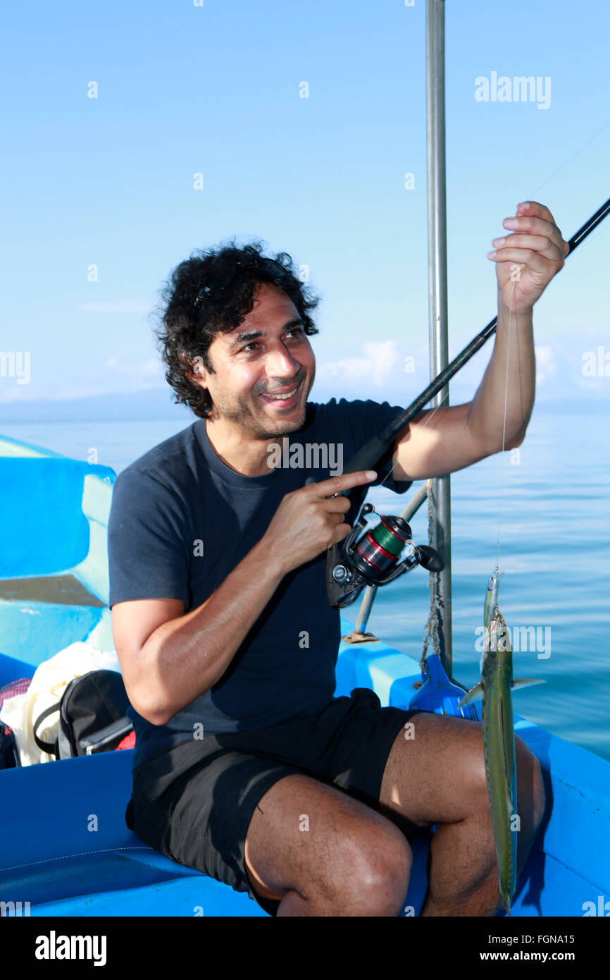 Ein indischer Mann Sportangeln Stockfoto