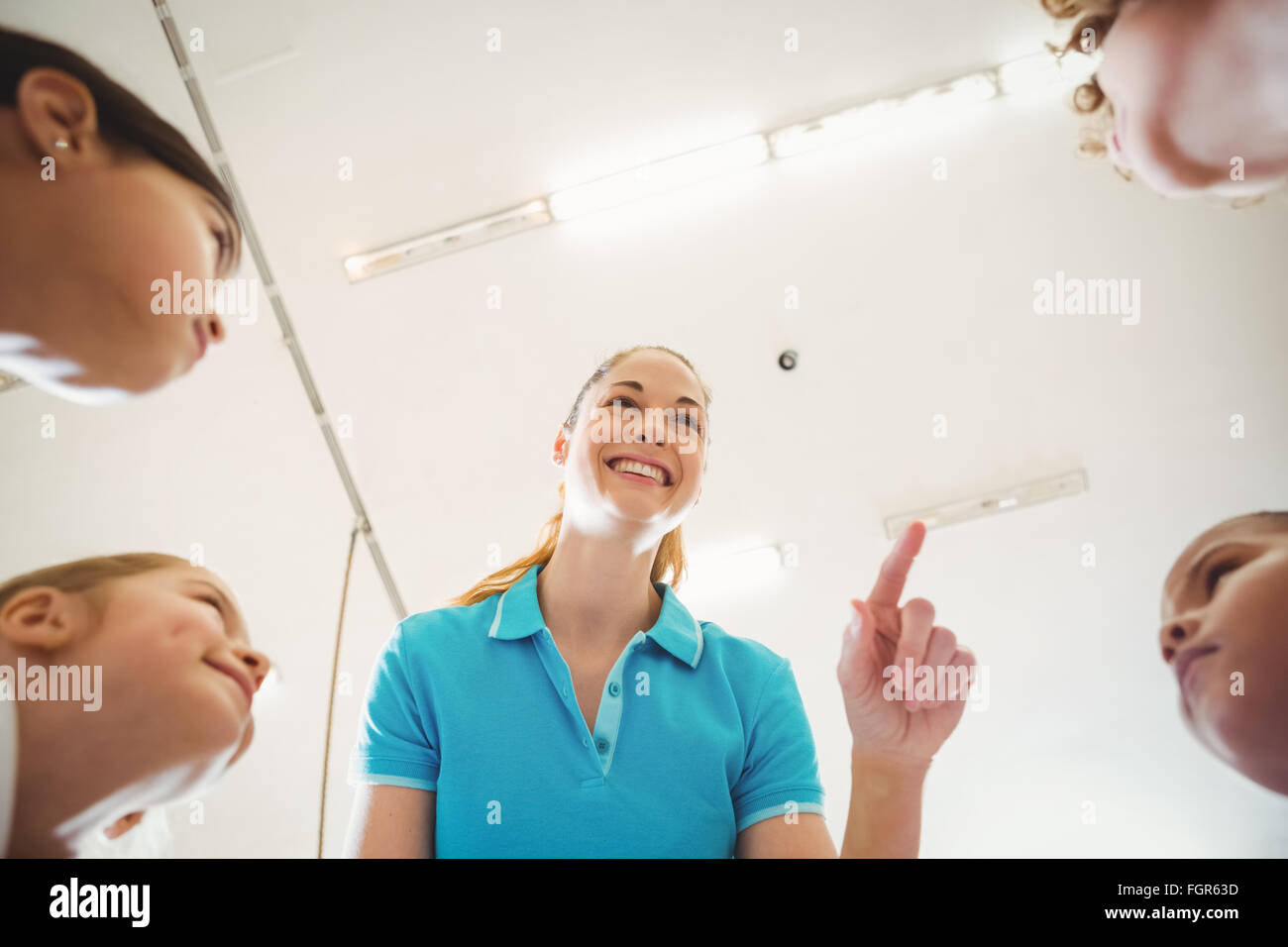 Lehrer mit einigen Studenten planen Stockfoto