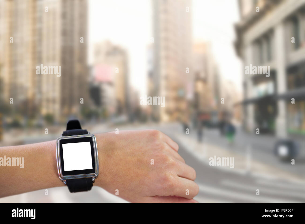 Zusammengesetztes Bild der Smartwatch am Handgelenk Stockfoto