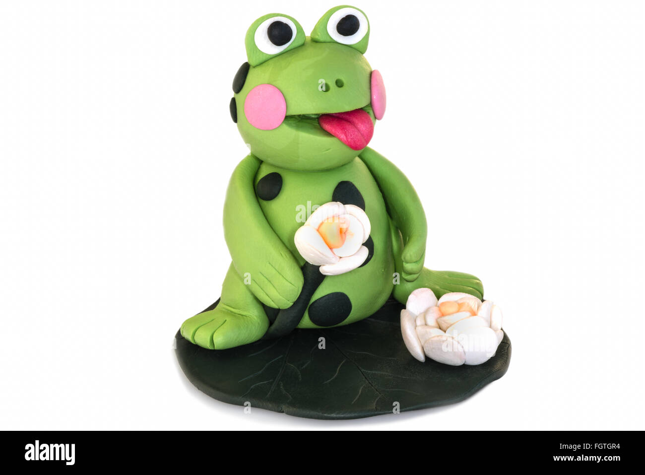 Frosch Figur gemacht von Fimo auf weißem Hintergrund Stockfotografie - Alamy