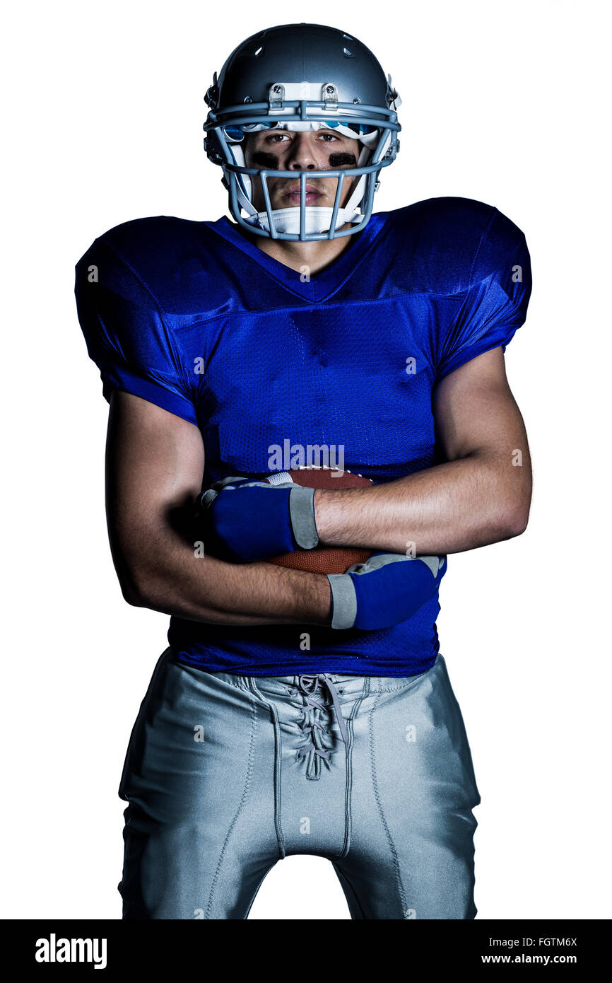 Porträt von zuversichtlich, US-amerikanischer American-Football-Spieler in uniform Stockfoto