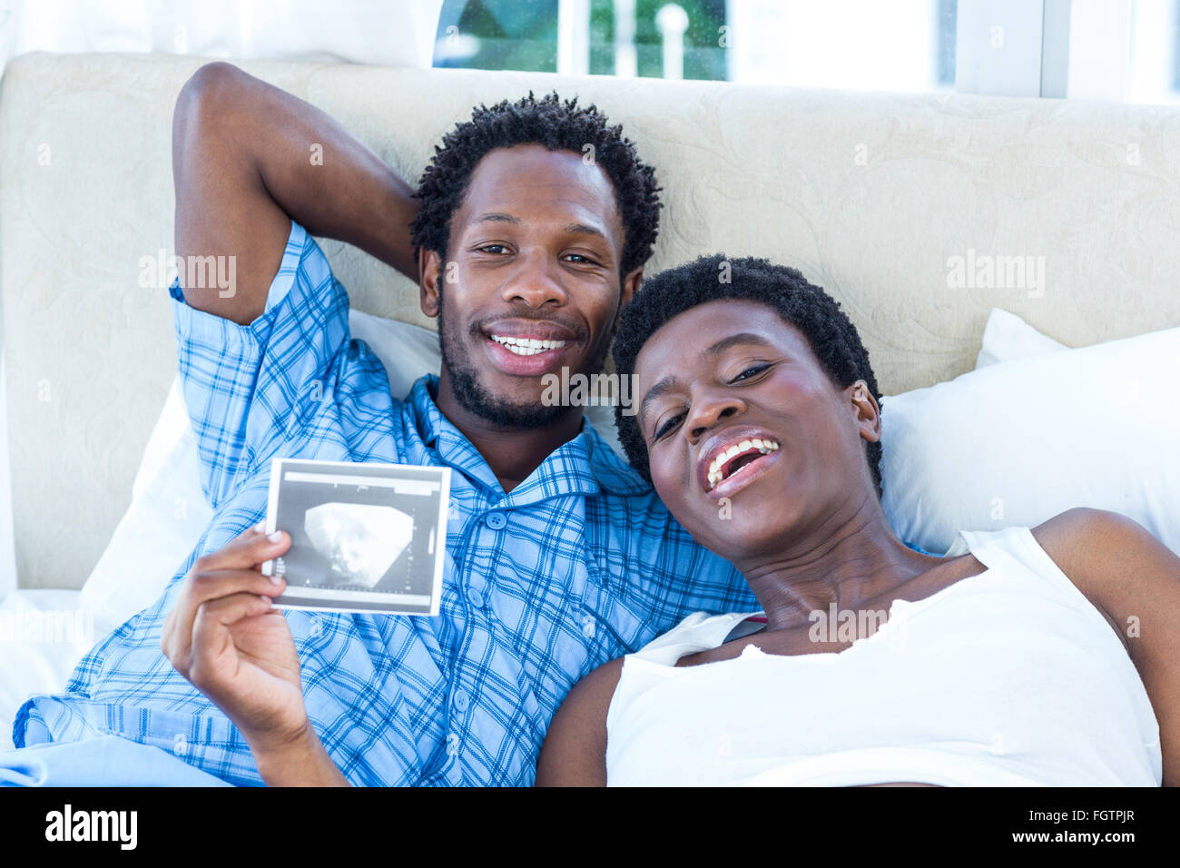 Porträt von glücklich Frau mit Ultraschall Stockfoto