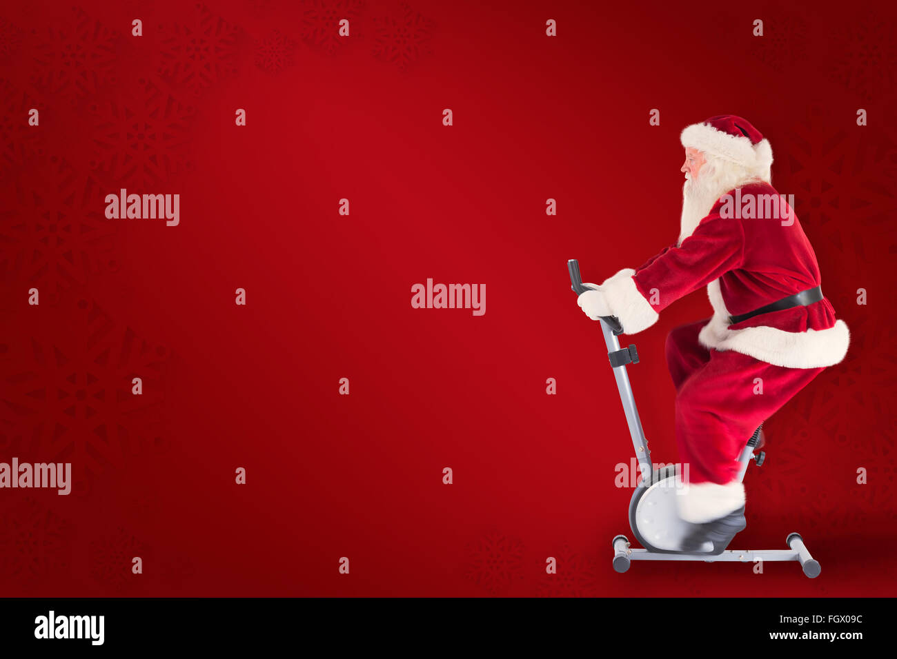 Zusammengesetztes Bild von Santa nutzt ein Hometrainer Stockfoto