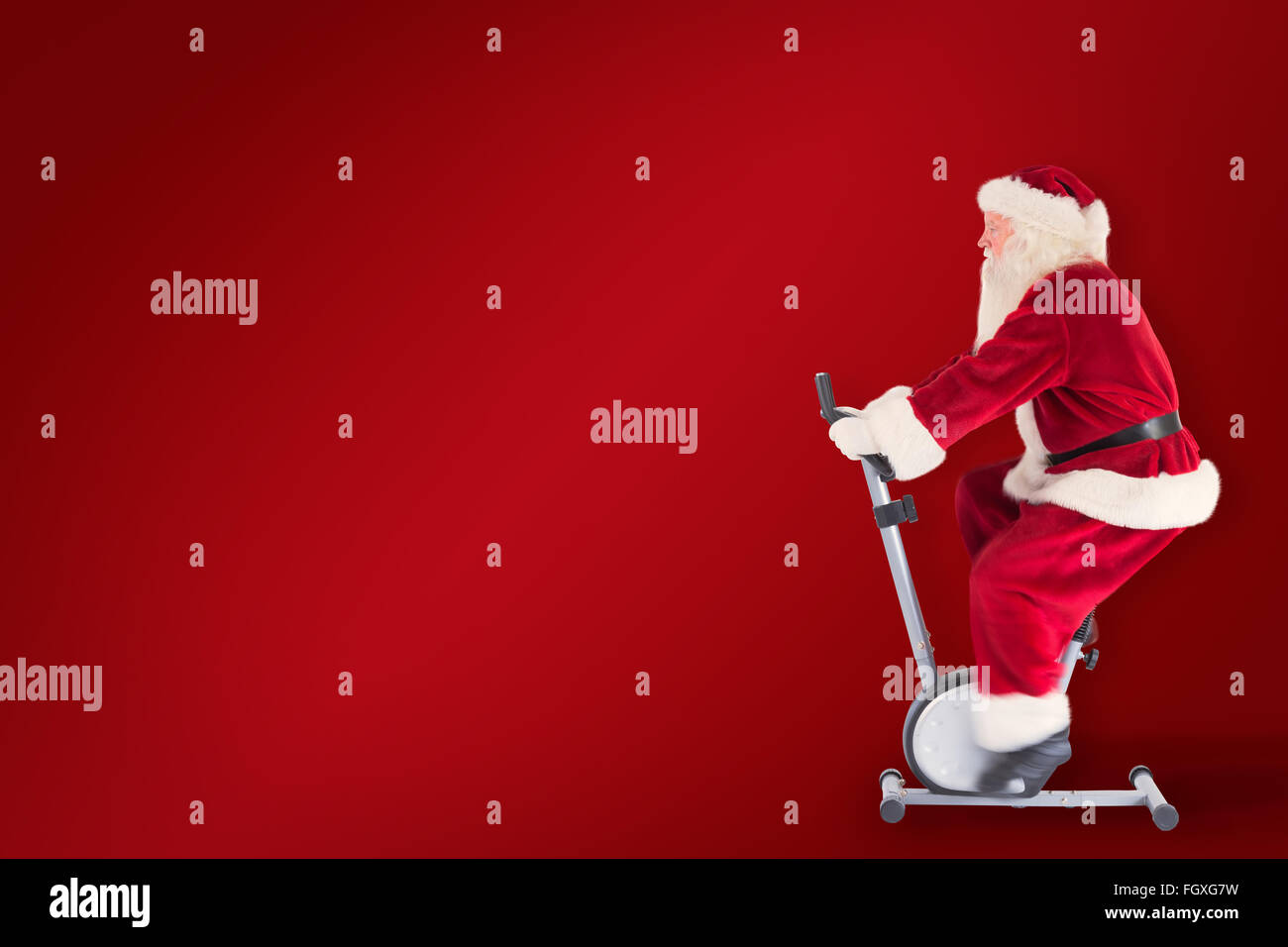 Zusammengesetztes Bild von Santa nutzt ein Hometrainer Stockfoto