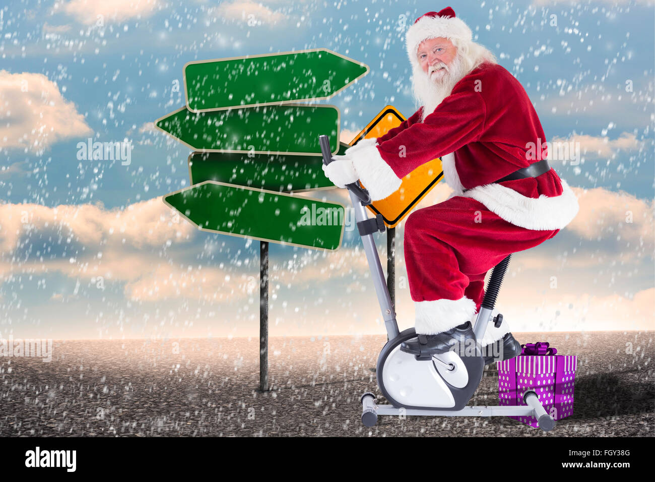 Zusammengesetztes Bild von Santa nutzt ein Hometrainer Stockfoto