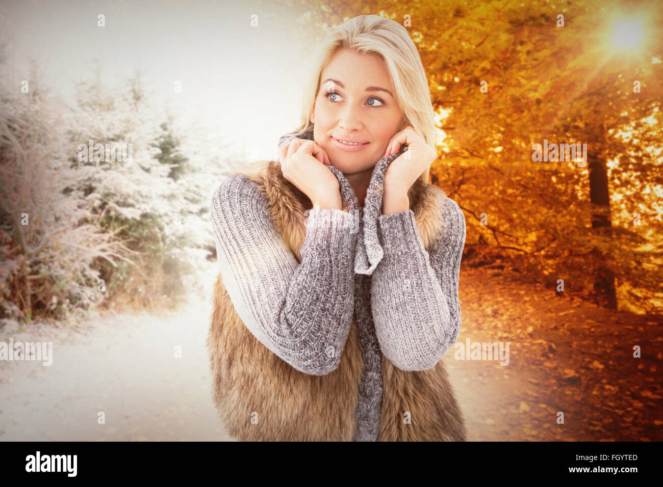 Zusammengesetztes Bild Blondine in Winterkleidung lächelnd Stockfoto