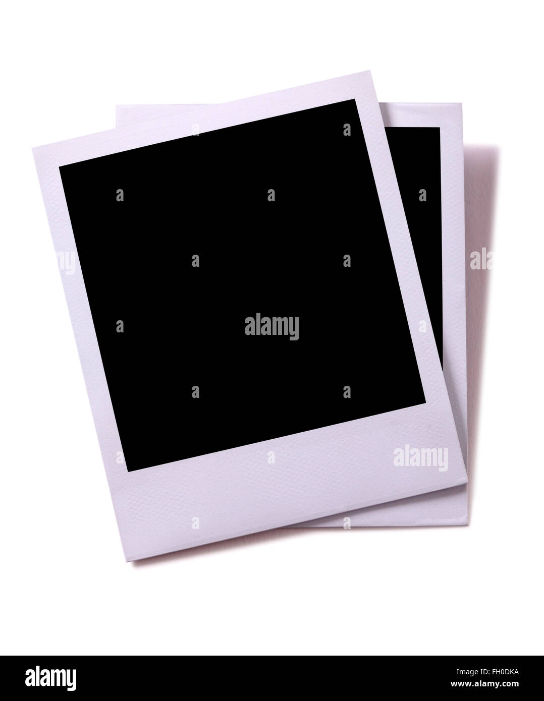 Zwei leere Polaroid-Stil Sofortbild-Kamera Foto-Abzüge isoliert auf weiss  mit Schatten Stockfotografie - Alamy