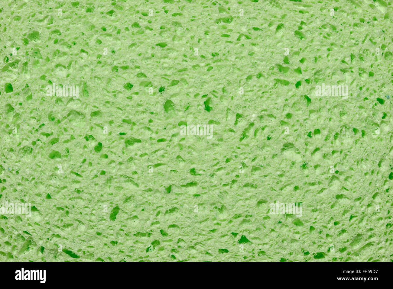 Detail eines grünen farbigen künstlichen Schwamm hautnah Stockfoto