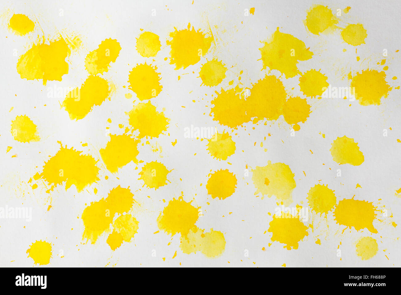 Aquarell gelben Spritzer Abstract Am weißen grobkörniges Papier. Design Element. Als Hintergrund verwenden. Stockfoto