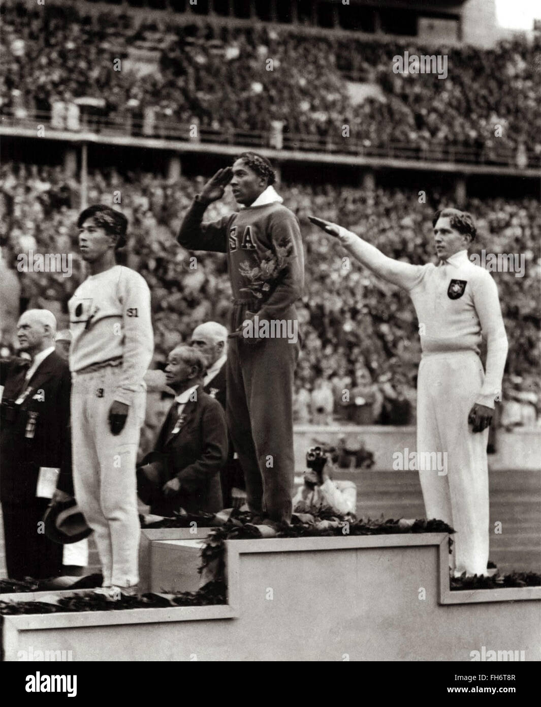 Jesse Owens gewinnt Gold Olympische Spiele 1936 Nazi-Deutschland Stockfoto