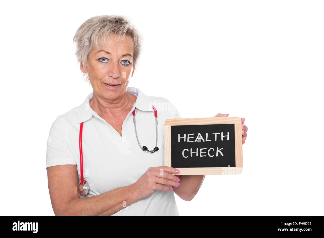 Krankenschwester mit Tafel und Text, Gesundheits-Check, isoliert auf weiss Stockfoto