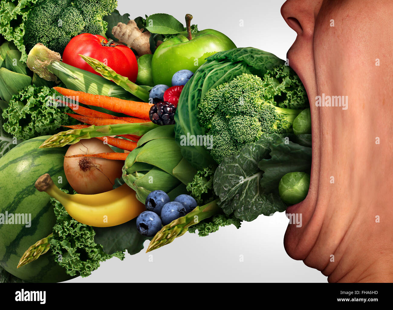 Essen Sie gesunde Ernährungskonzept als eine Person mit einem weiten, offenen gestreckt Mund essen frisches Obst und Gemüse als Gesundheits- und Fitness Lifestyle-Symbol. Stockfoto