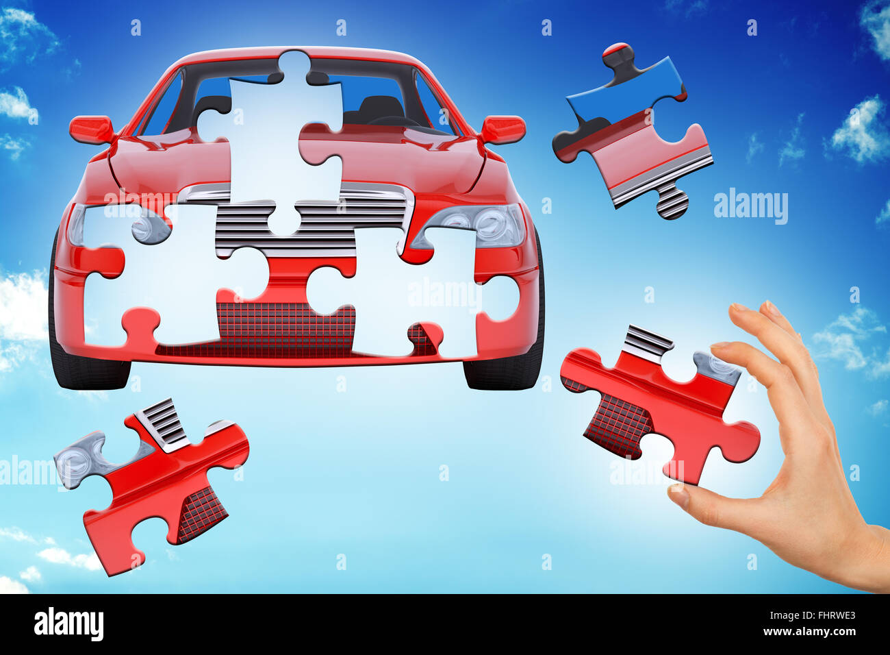 Hand und Auto puzzle Stockfoto