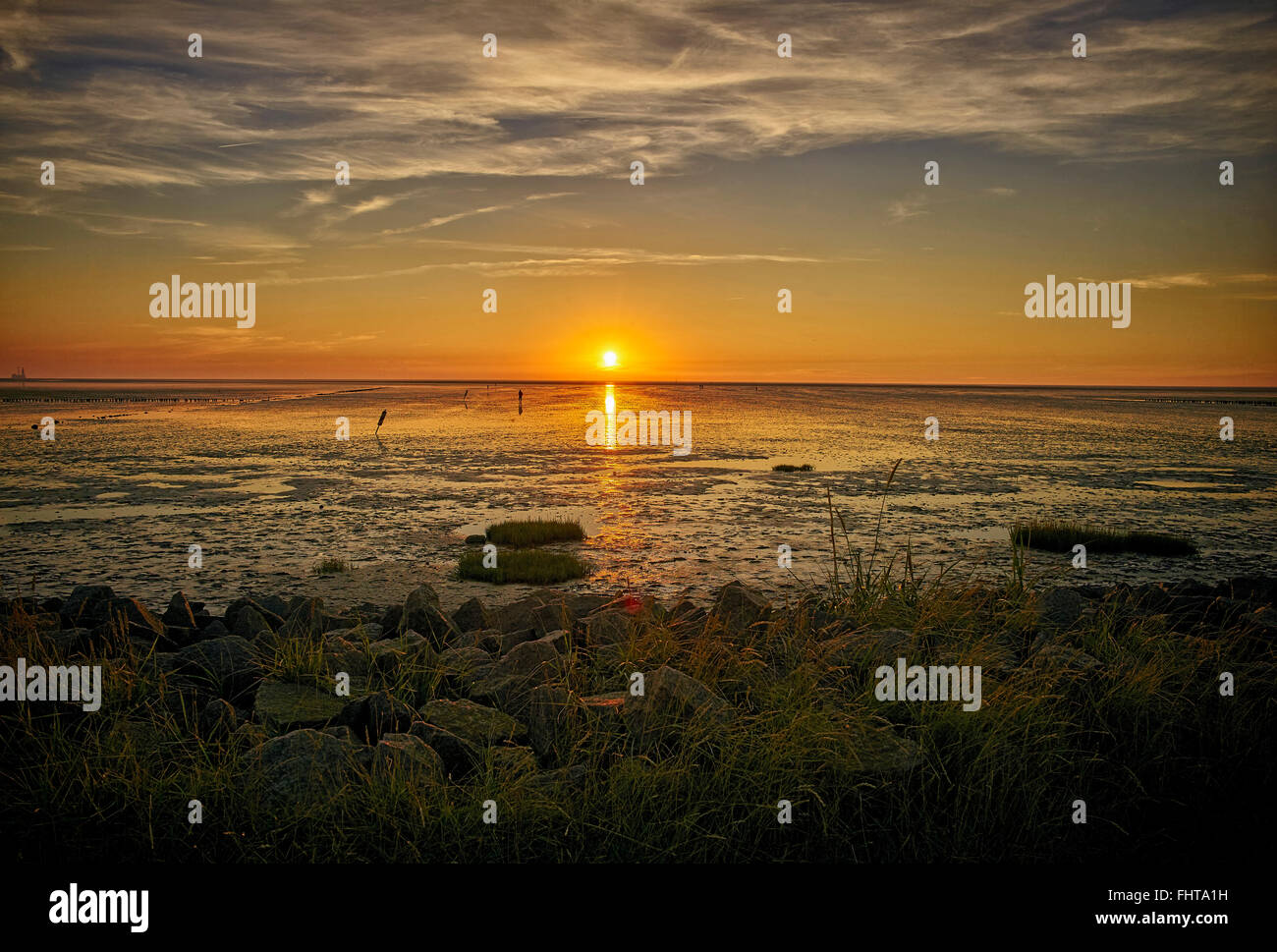 Deutschland, Dithmarschen, Friedrichskoog-Spitze, Sonnenuntergang an der Nordsee-Nordsee Stockfoto