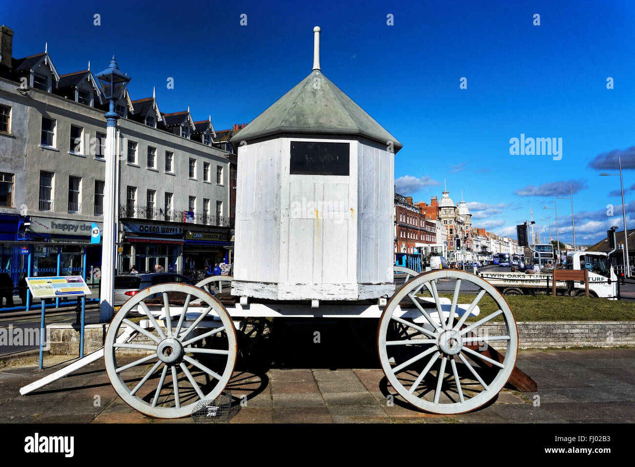 Eine Replik von George III Baden Maschine am Strand von Weymouth, Großbritannien Stockfoto