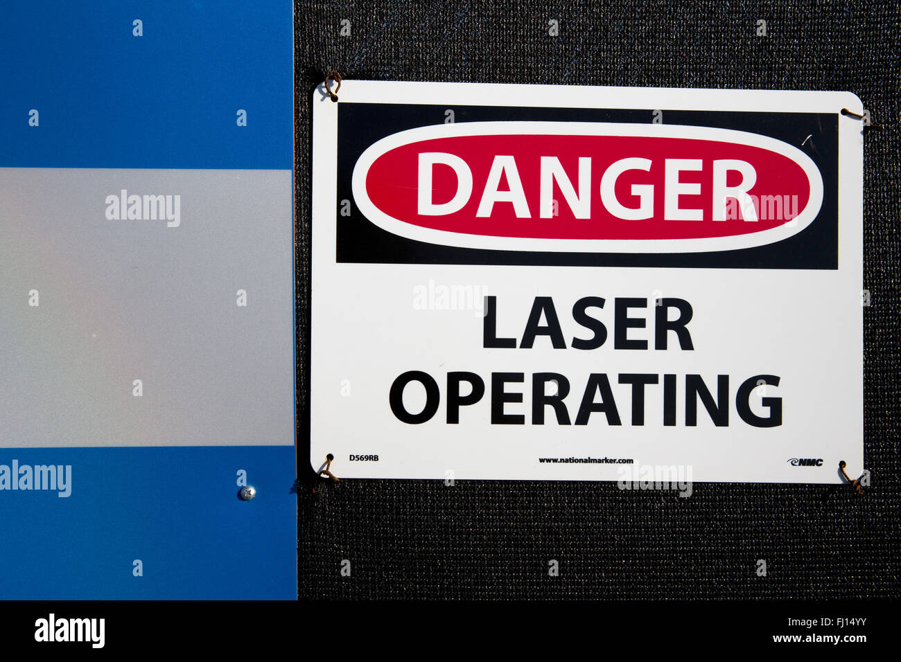 industrielle Laser-Warnschild Stockfoto