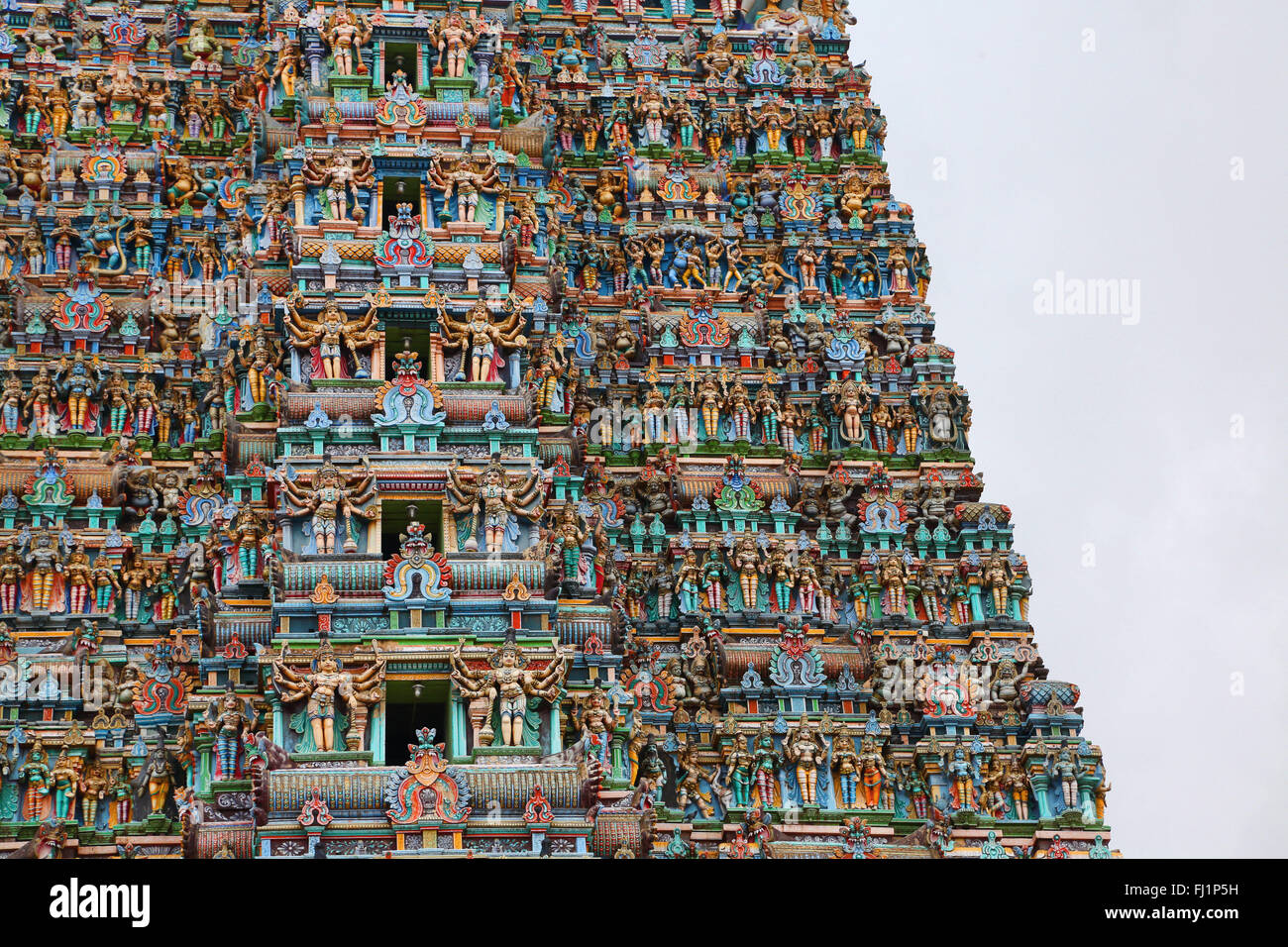 Außenwand/Gopuram der hinduistischen Sri Meenakshi Tempel, Madurai, Tamil Nadu, Indien Stockfoto