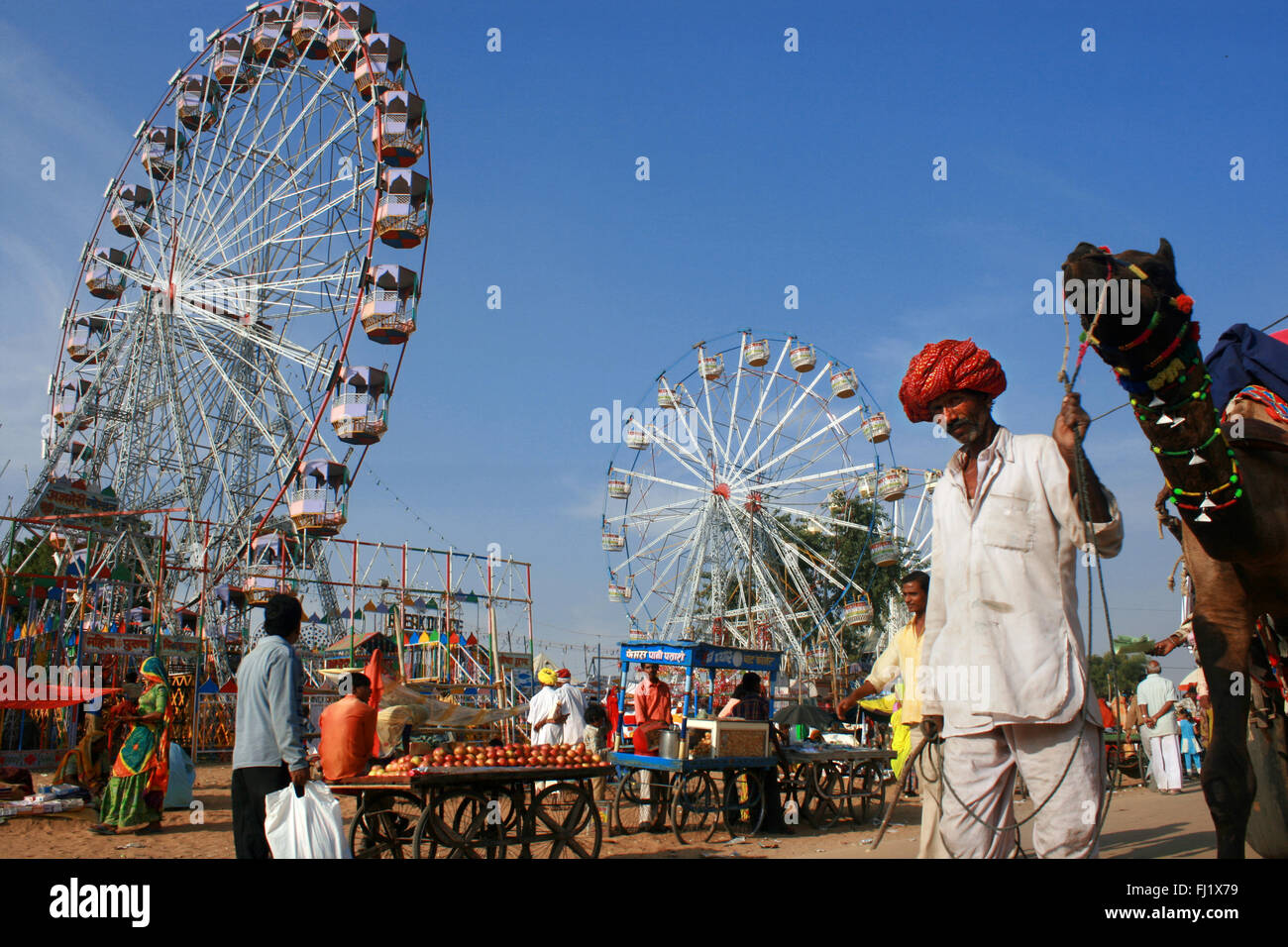 Pushkar Mela camel fair, Leute, Atmosphäre und street scene Stockfoto