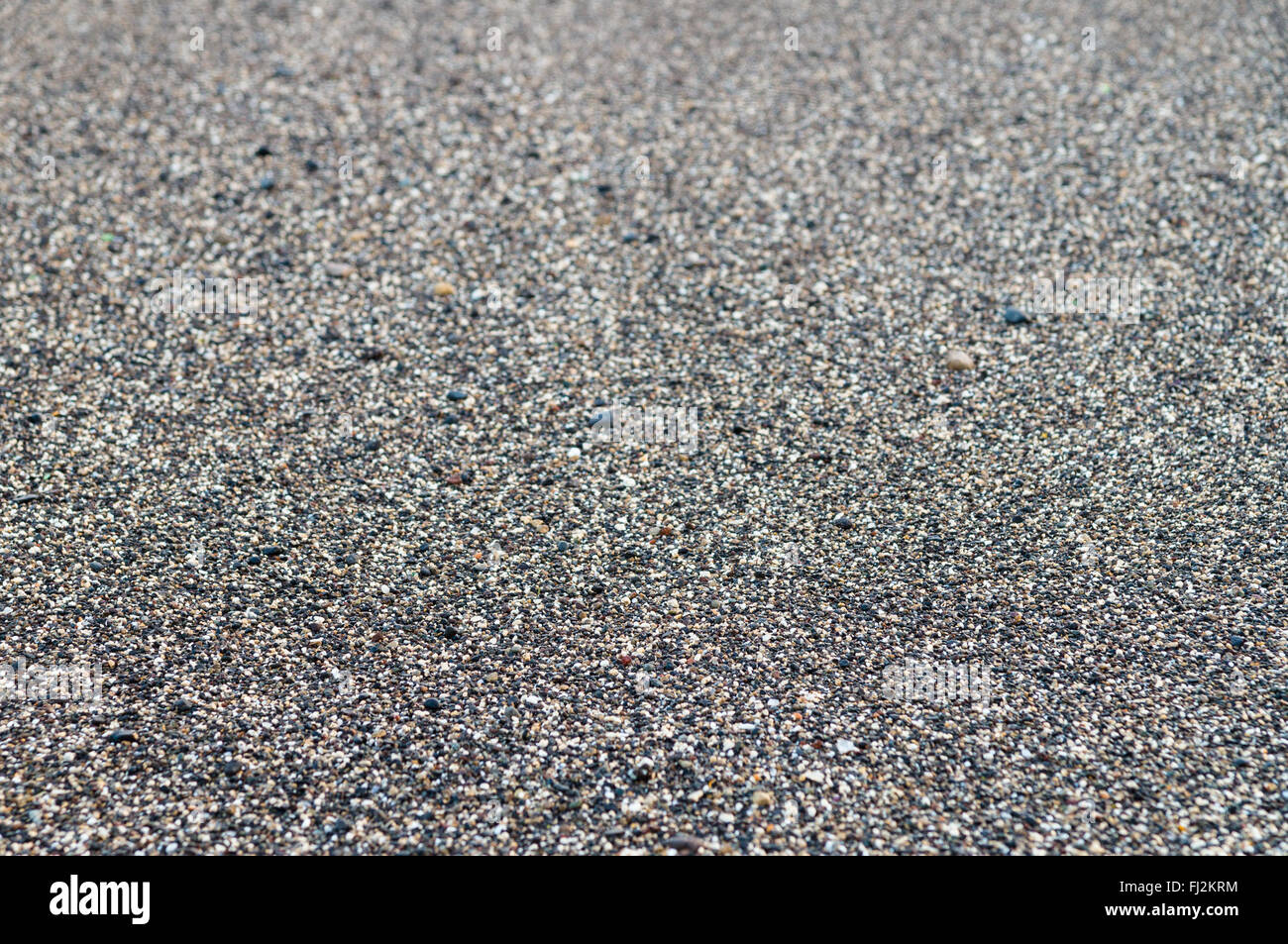 Steinigen Küste Hintergrund, Closeup mit selektiven Fokus Stockfoto
