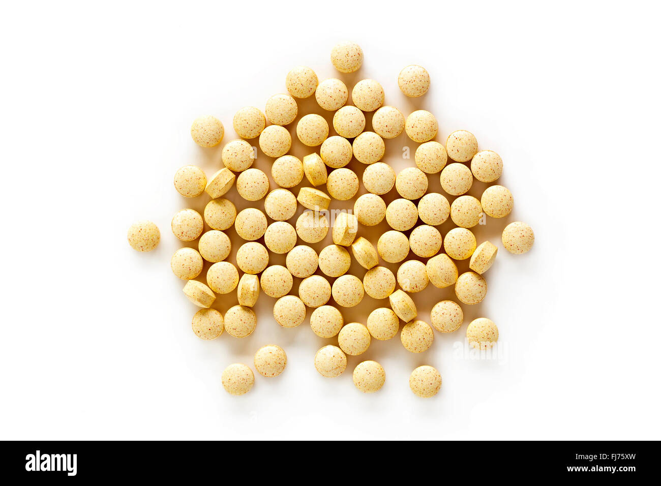 Ein Haufen von Folsäure-Ergänzung Vitamintabletten isoliert auf einem weißen Hintergrund von oben. Stockfoto