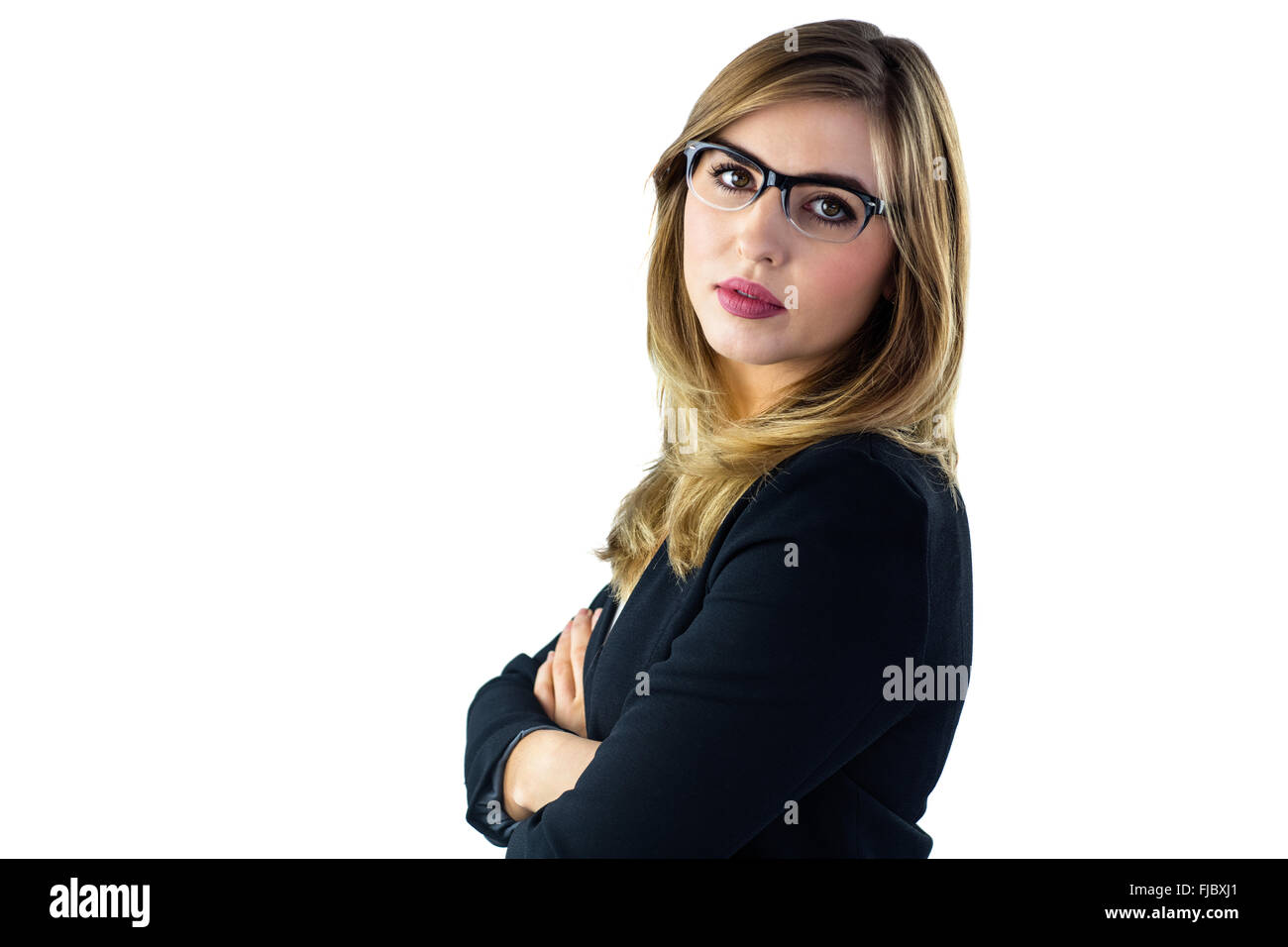 Frau mit verschränkten Armen Blick in die Kamera Stockfoto