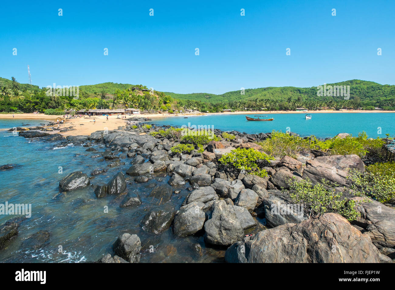 Om Beach in Gokarna im indischen Bundesstaat Karnataka ist ein beliebtes Ziel für Rucksacktouristen Stockfoto