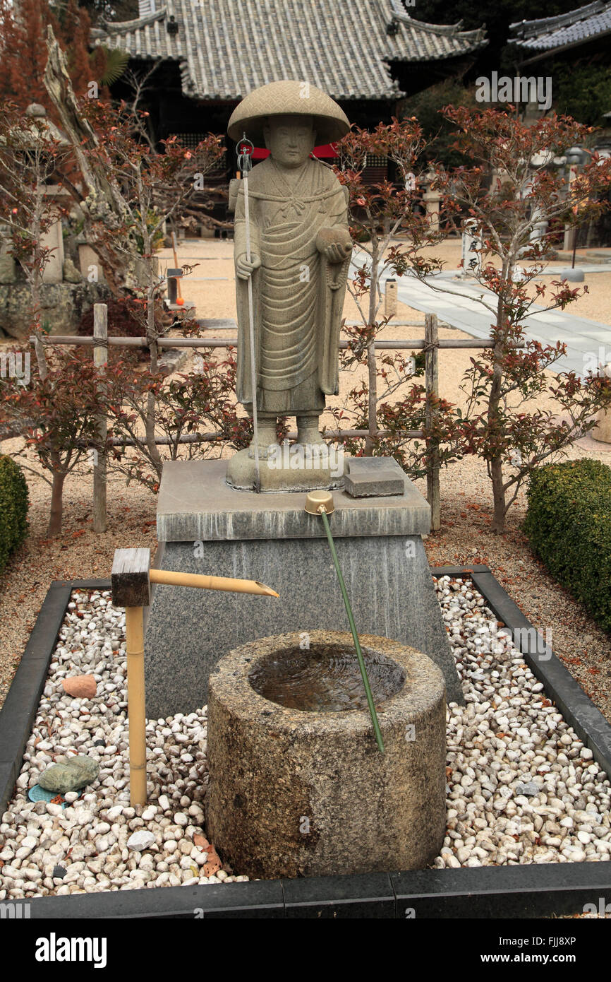 Japan, Takahashi, Yakusiin Tempel, Pilger Statue, Präfektur Okayama Stockfoto