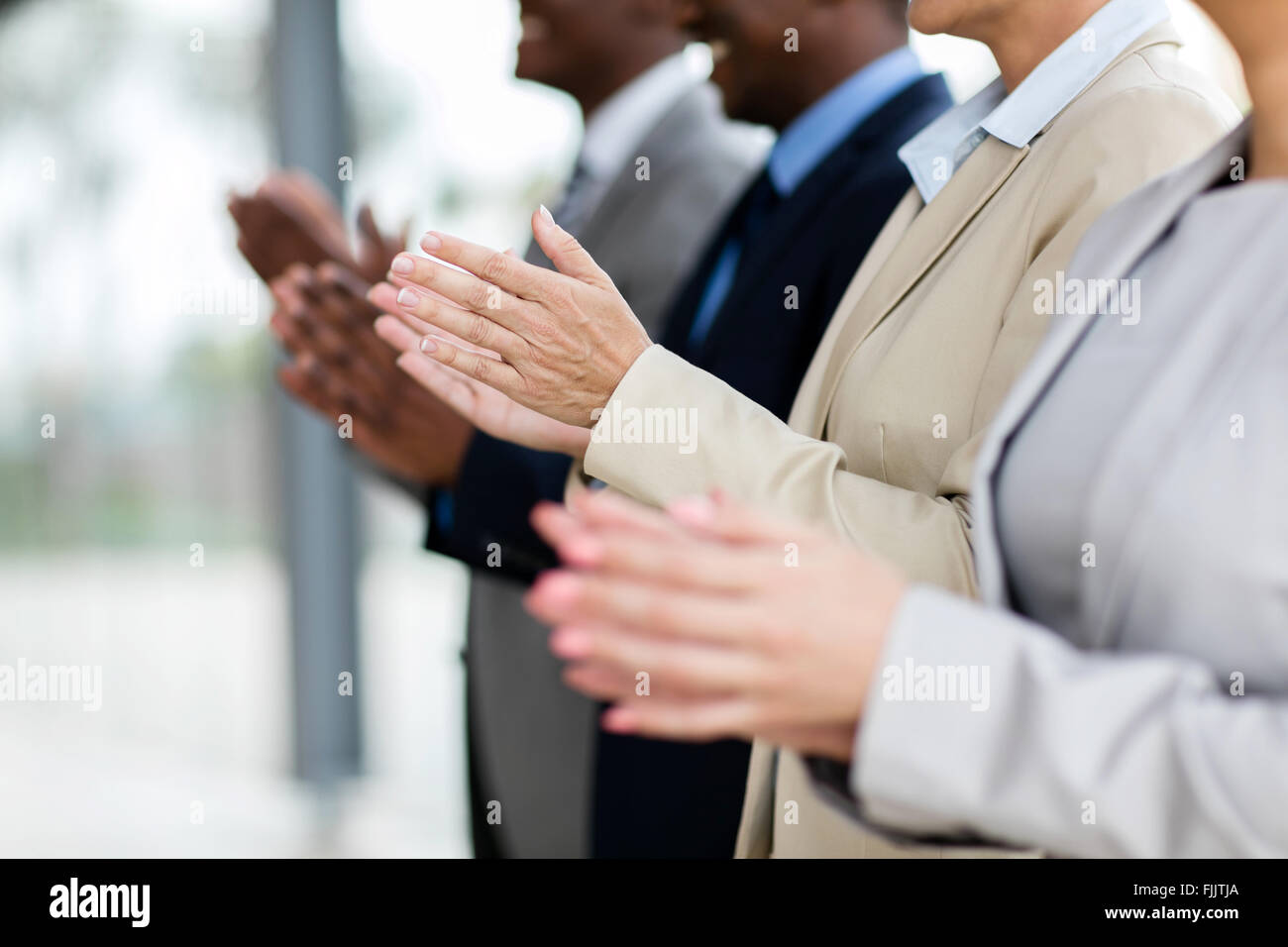 Unternehmensgruppe applaudieren Sitzung Präsentation Stockfoto