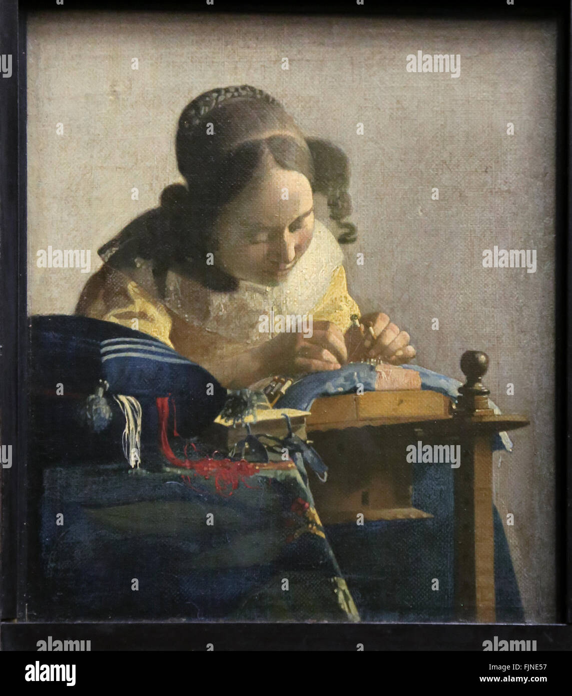 Johannes Vermeer (1632-1670). Niederländischer Maler. Die Spitzenklöpplerin, 1669-1670. Louvre-Museum. Paris. Frankreich. Stockfoto