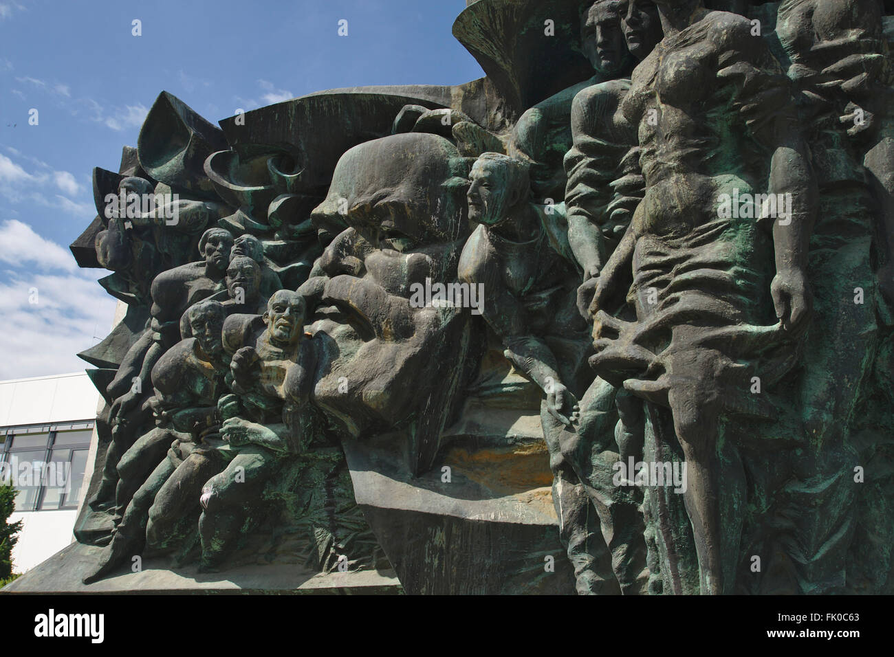 "Aufbruch", Bronzerelief mit Karl Marx, sozialistischen Realismus, jetzt auf dem Campus Jahnallee, Deutschland, Leipzig Stockfoto