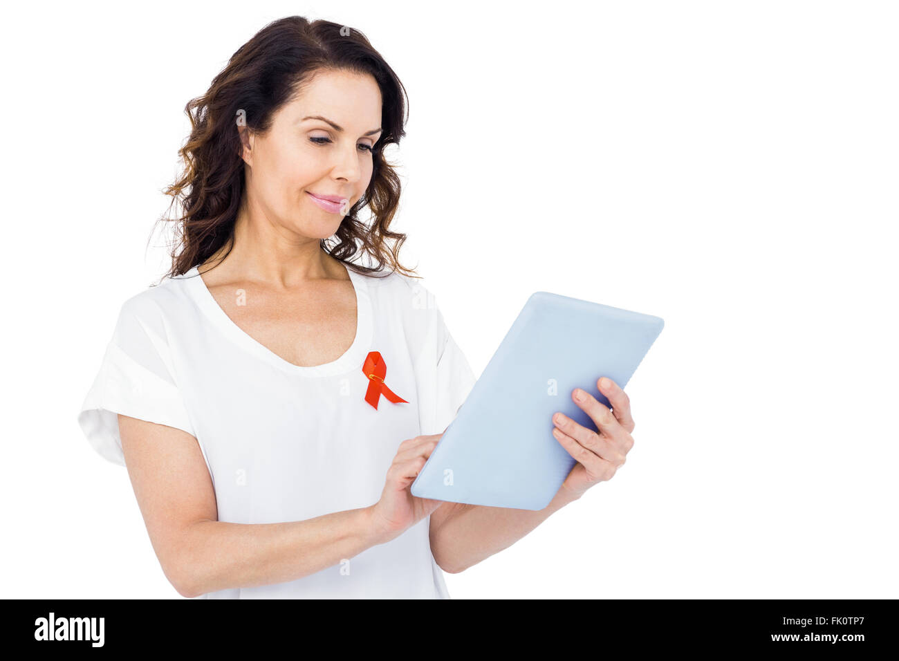 Frau mit roten Aids-Schleife mit tablet Stockfoto