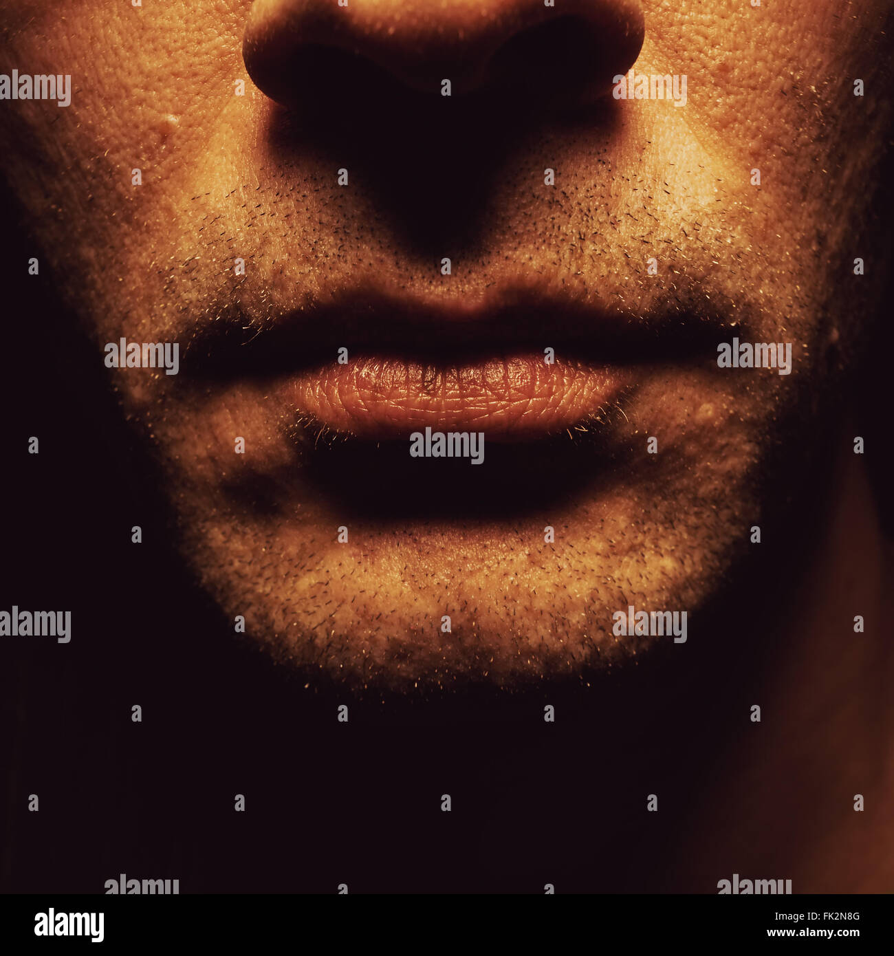 Details eines Mannes Gesicht, Mund und unrasierten Gesicht. Stockfoto