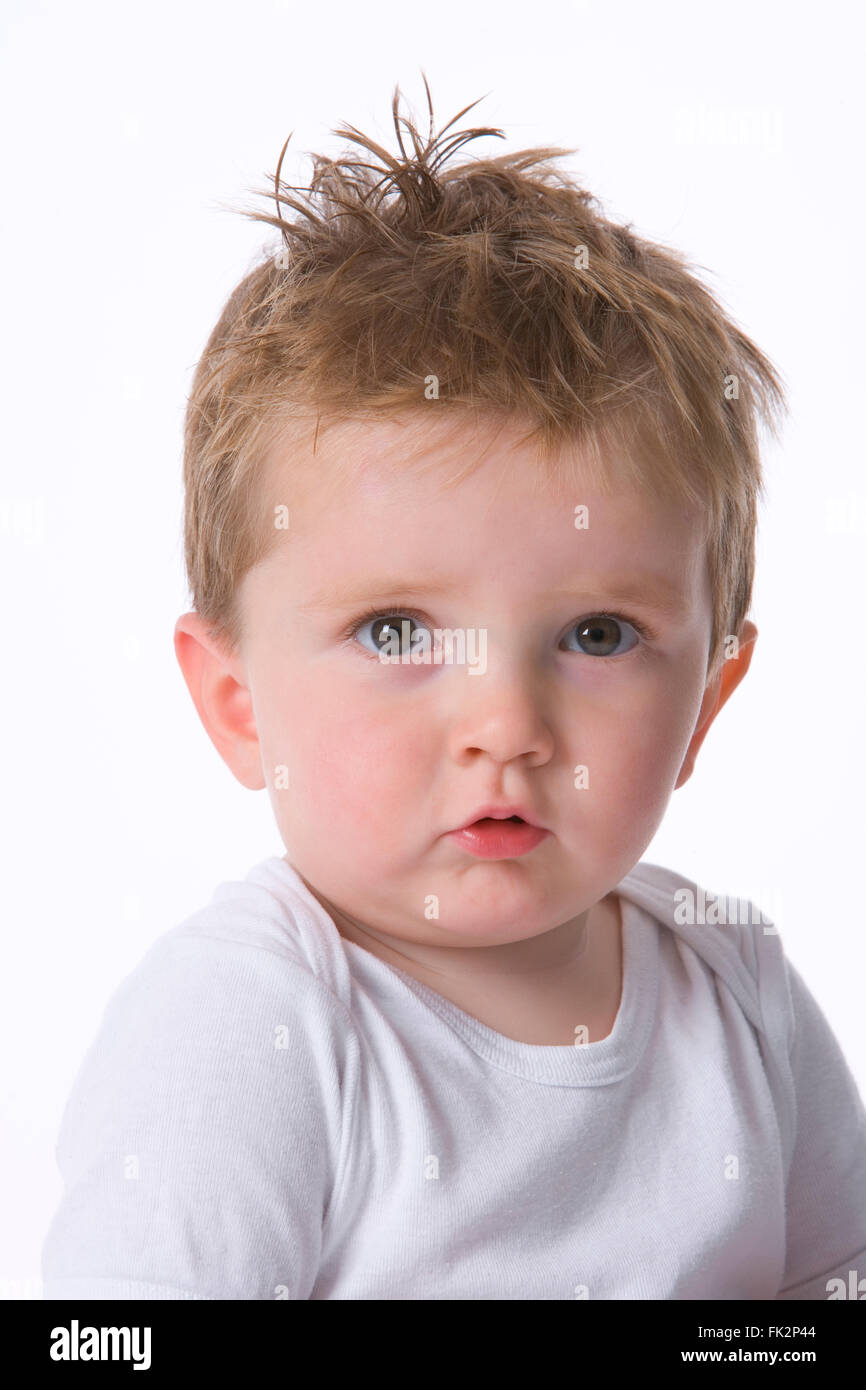 Portrait Of A Cool Toddler Boy auf weißem Hintergrund Stockfoto