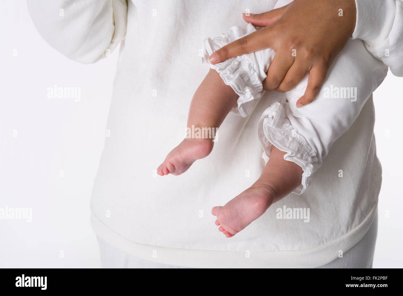 Baby-Füßchen im Studio Stockfoto