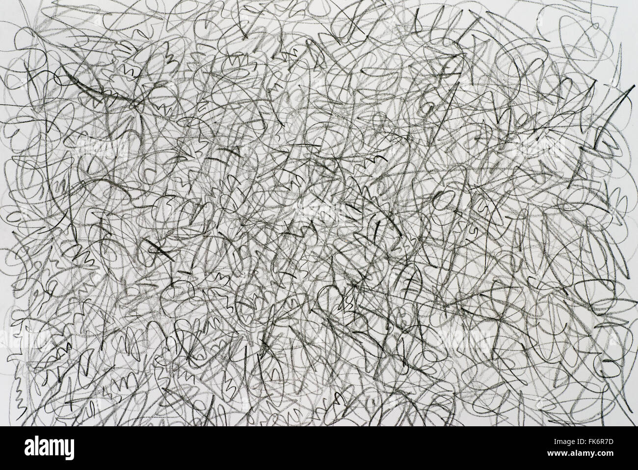 Wachsmalstift Kritzeleien auf weißem Papierhintergrund Stockfoto