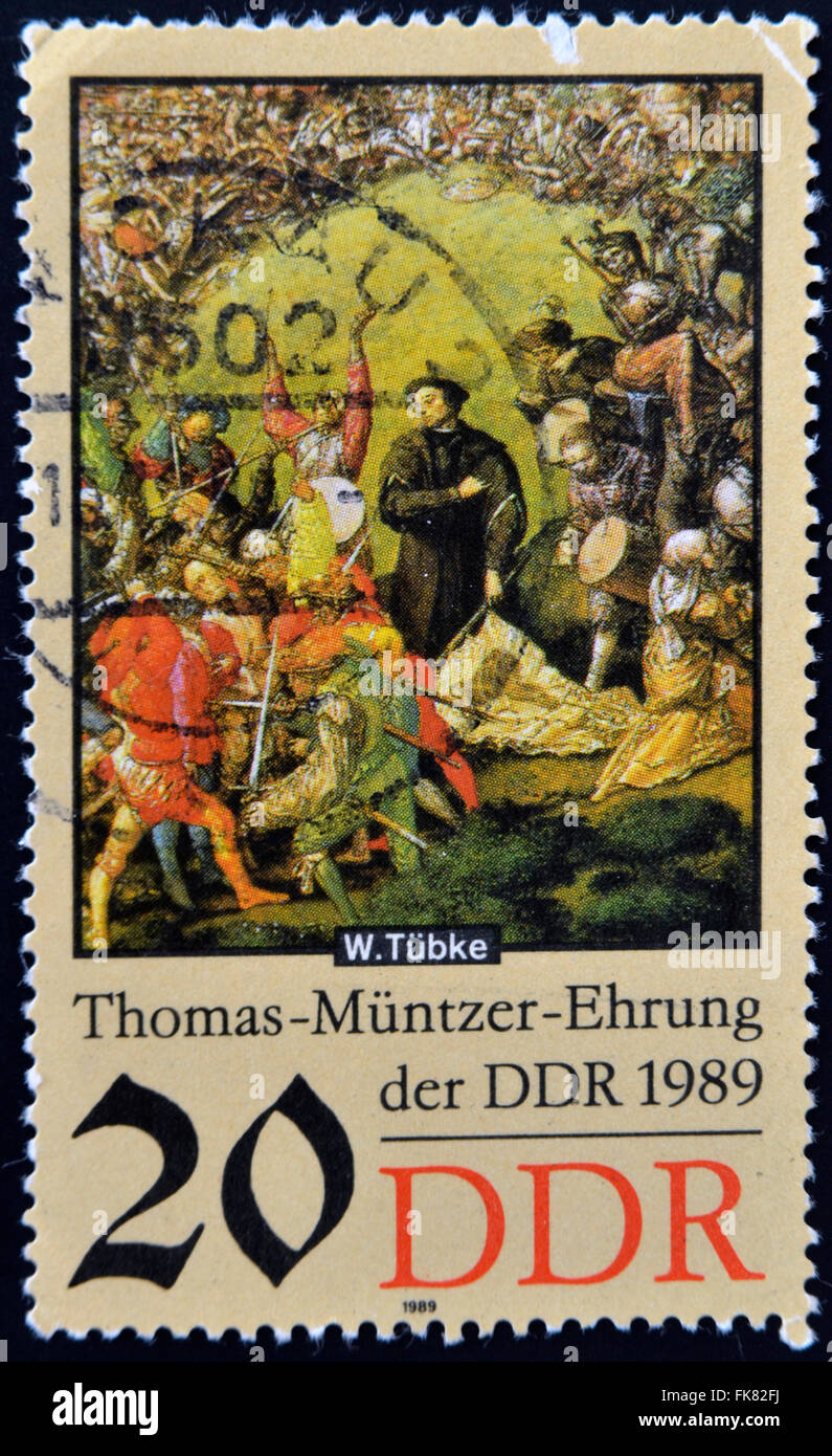 Deutschland - CIRCA 1989: eine Briefmarke gedruckt in DDR-Shows Kampfszene, Detail der Malerei frühen bürgerlichen Revolution in Deutschland Stockfoto