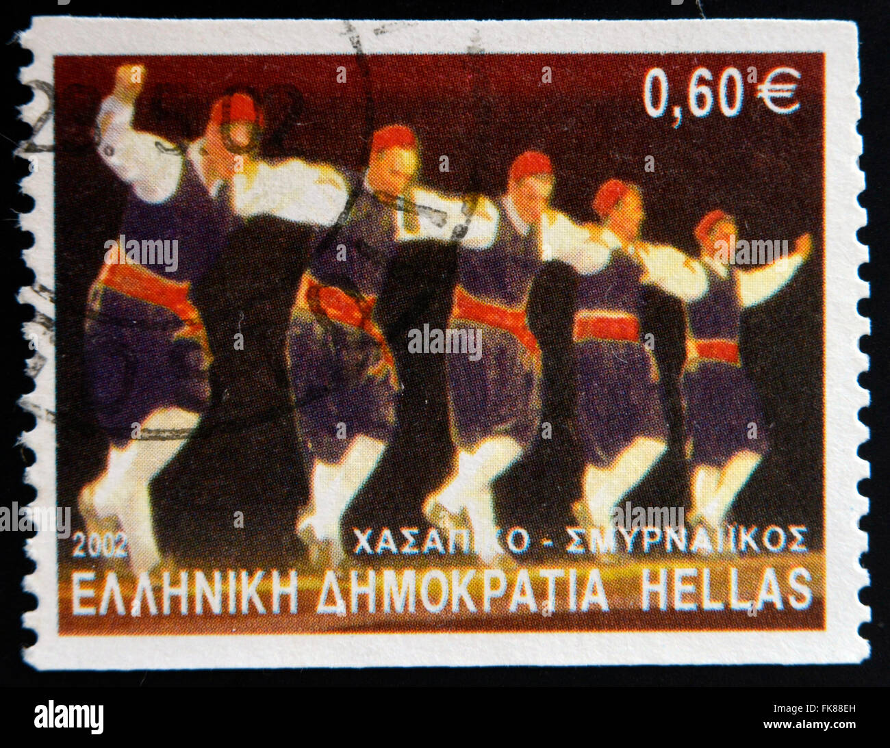 Griechenland - ca. 2002: Eine Briefmarke gedruckt in Griechenland, die griechischen Tänzen gewidmet zeigt Chassapiko Tanz, Smyrna, ca. 2002. Stockfoto