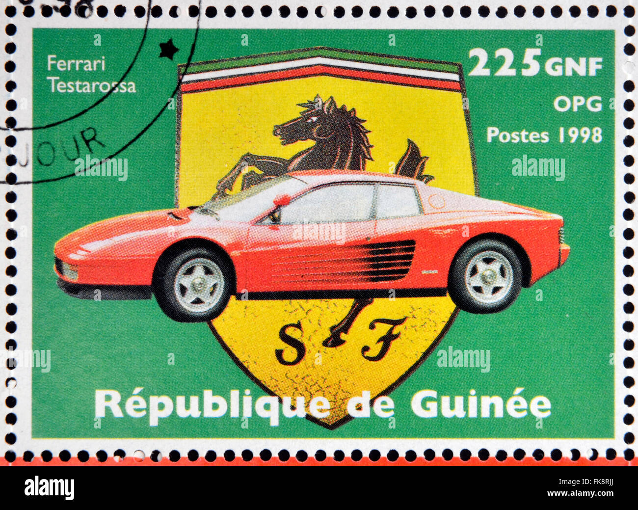 GUINEA - ca. 1998: Briefmarke gedruckt in Guinea Jahrestag des Enzo Ferrari, Ferrari Testarossa, ca. 1998 zeigt Stockfoto