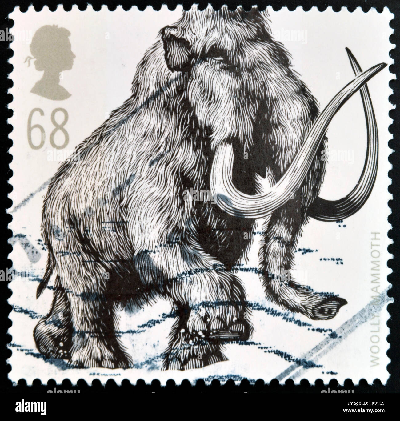 Vereinigtes Königreich - CIRCA 2006: Eine Briefmarke gedruckt in Großbritannien zeigt Wollhaarmammut (Mammuthus Primigenius), circa 2006 Stockfoto