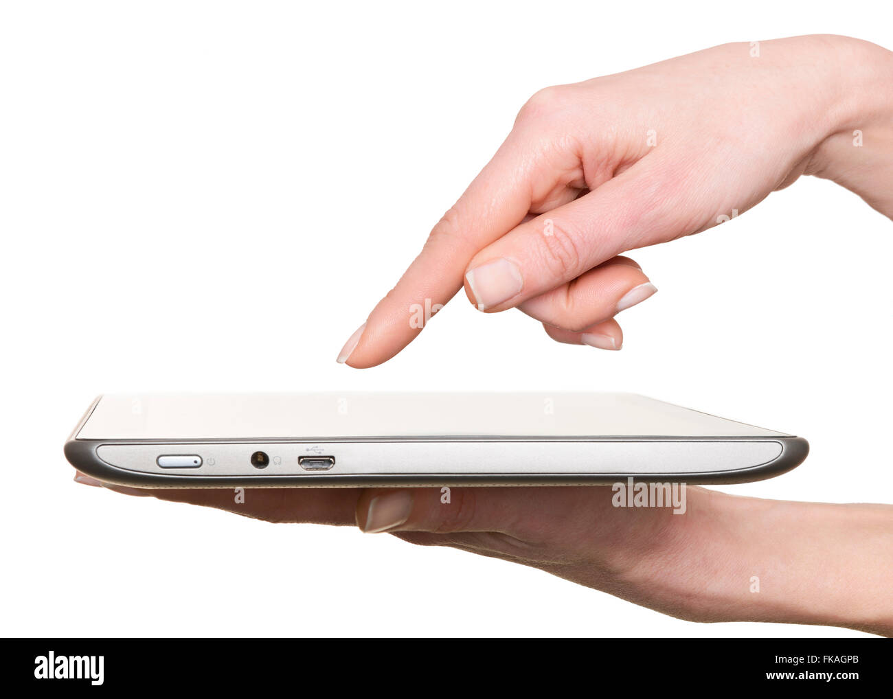 Fingerzeig auf einem Tablet-Computer-Bildschirm ausgeschnitten. Stockfoto