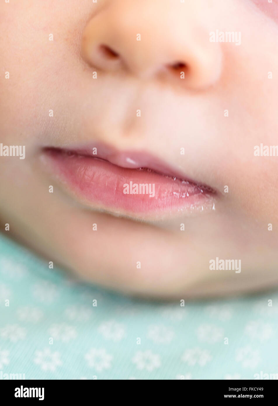Nahaufnahme von Baby boy's (2-5 Monate) Mund Stockfoto