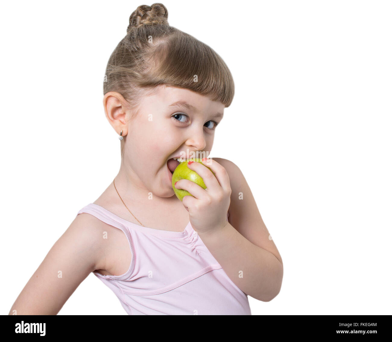 kleine Ballerina mit Apfel Stockfoto