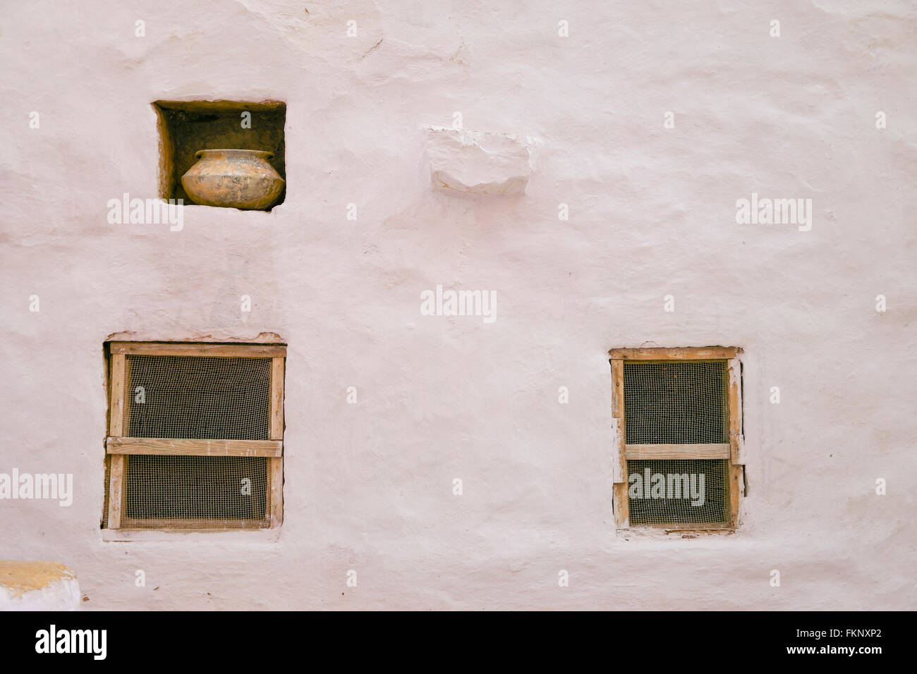 Dekorativer Wandschmuck und kleine Fenster in die goldene Festung von Jaisalmer in Indien. Stockfoto Dekorativer Wandschmuck und kleine Fenster in die goldene Festung von Jaisalmer in Indien. Stockfoto
