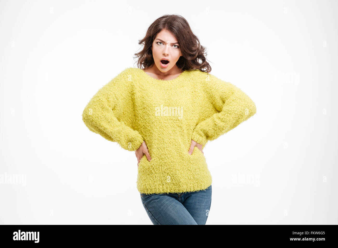 Böse Frau stand isoliert auf weißem Hintergrund Stockfoto