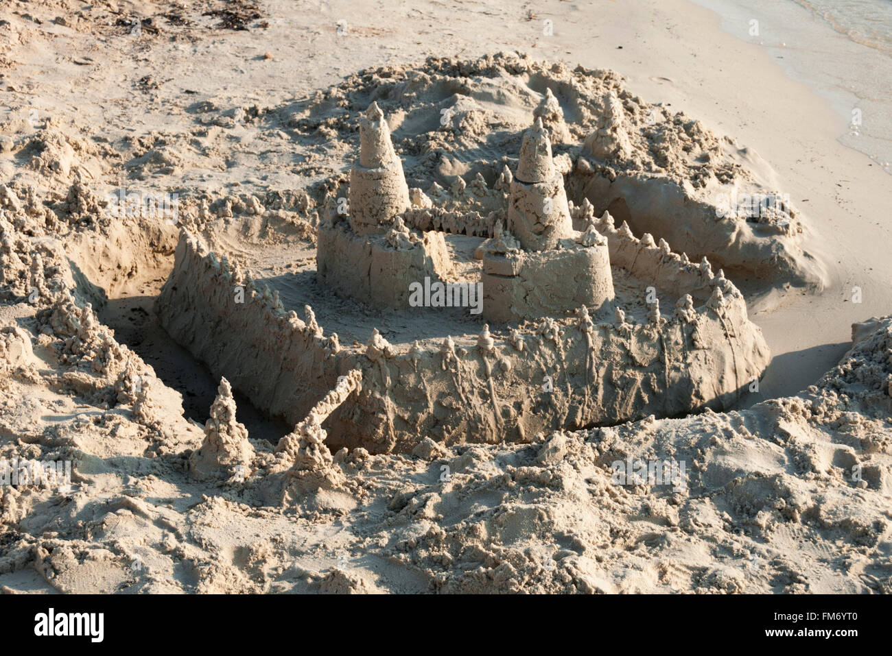 Eine Sandburg am Strand Stockfoto