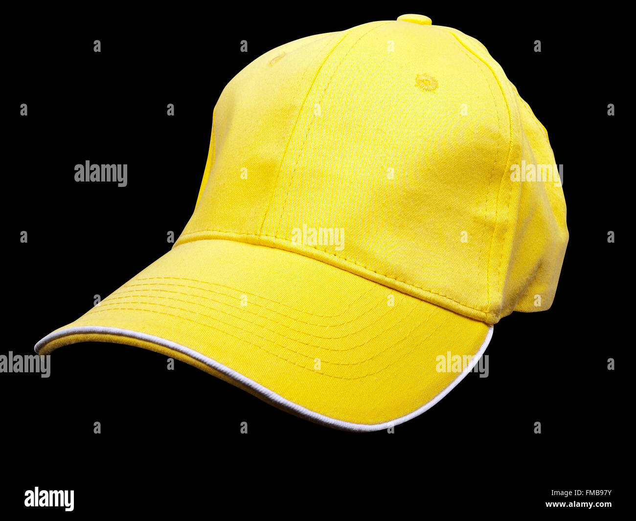 gelbe Baseball-Kappe auf schwarzem Hintergrund, Studio gedreht Stockfoto