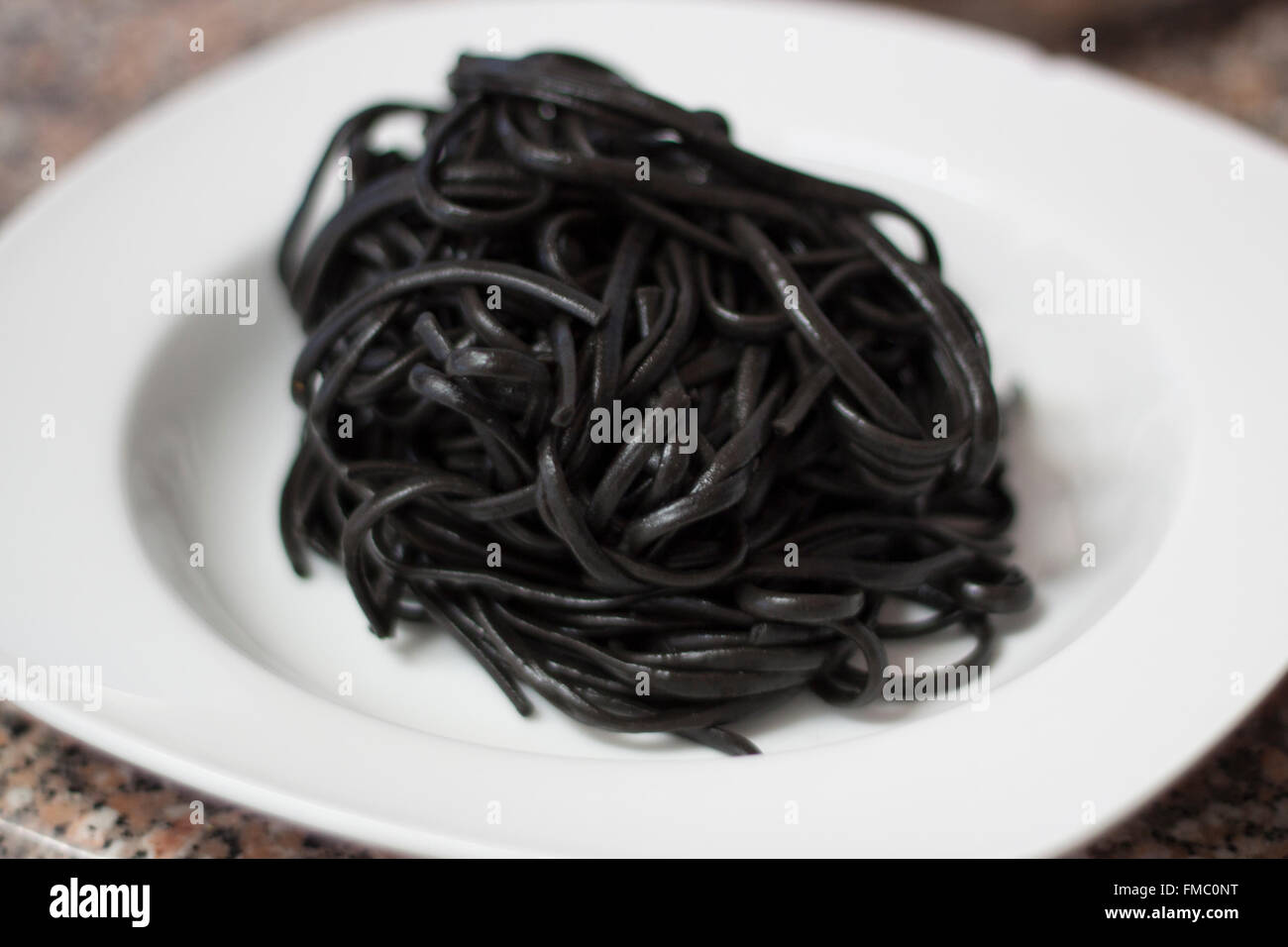 Schwarze spaghetti Stockfoto