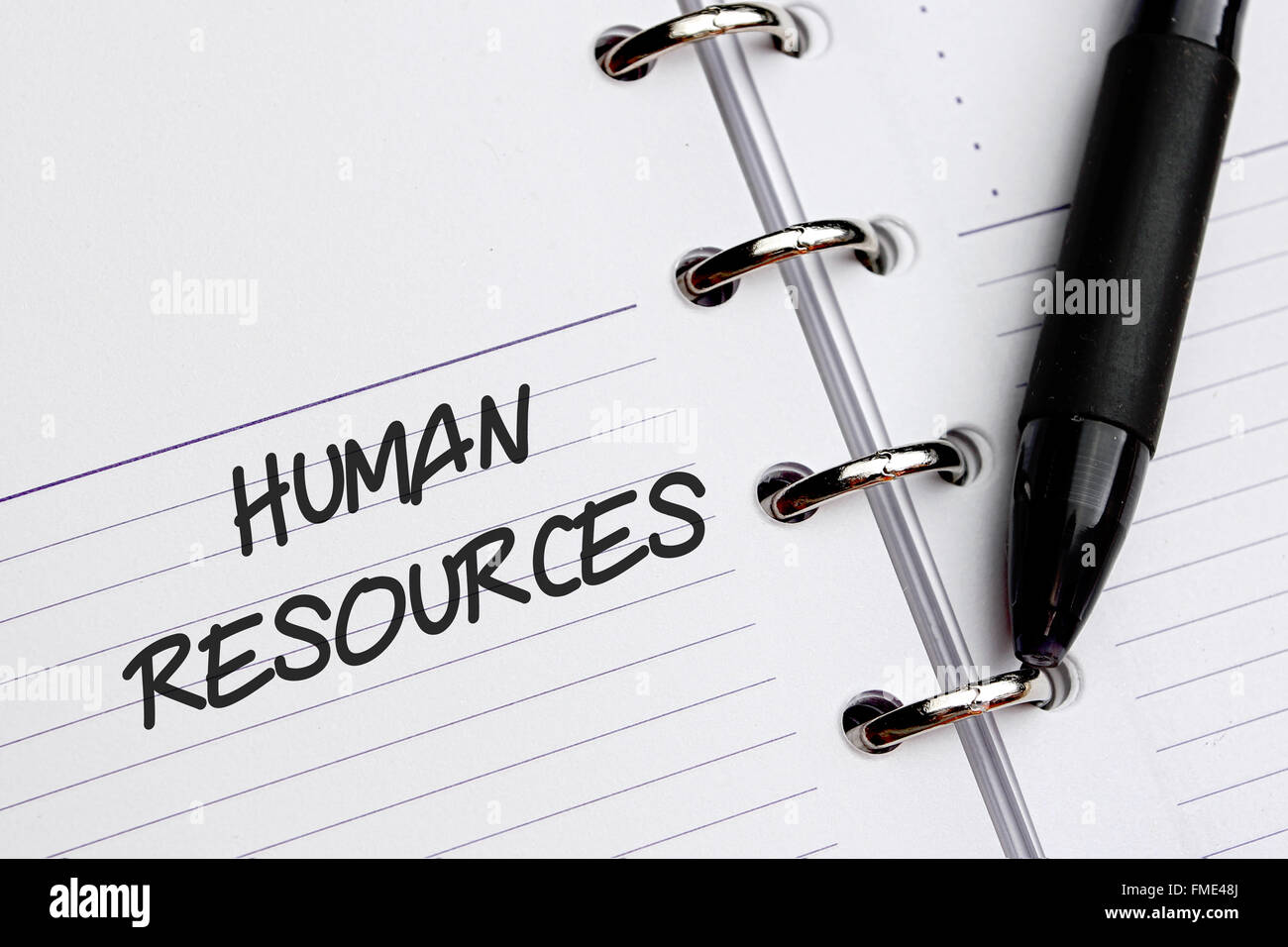 Human Resources Wort auf Papier geschrieben Stockfoto
